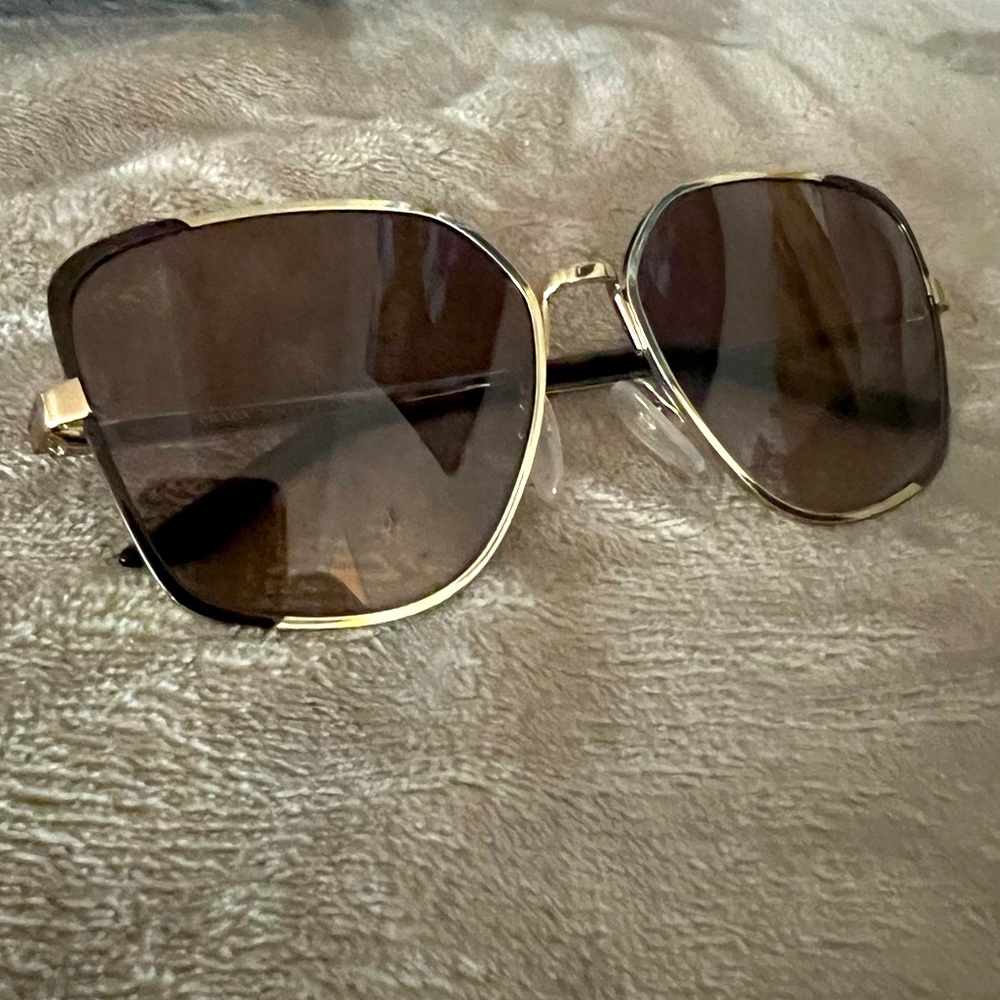 Prada women’s sunglasses SPR60X